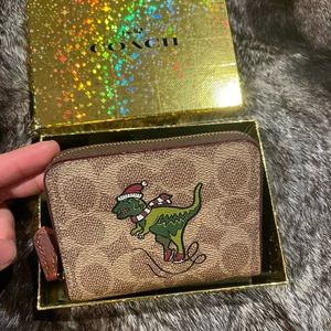 Coach trifold limited edition Dino small wallet.